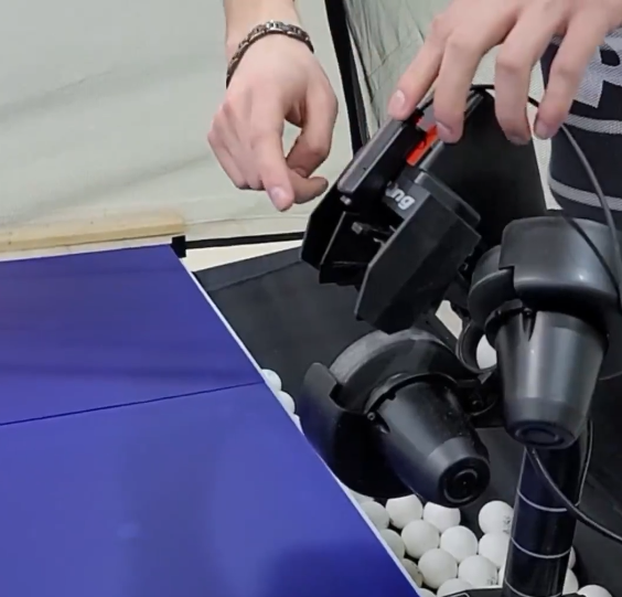 Showing where the ballsensor should be attached to a table tennis robot with a 3-wheel head