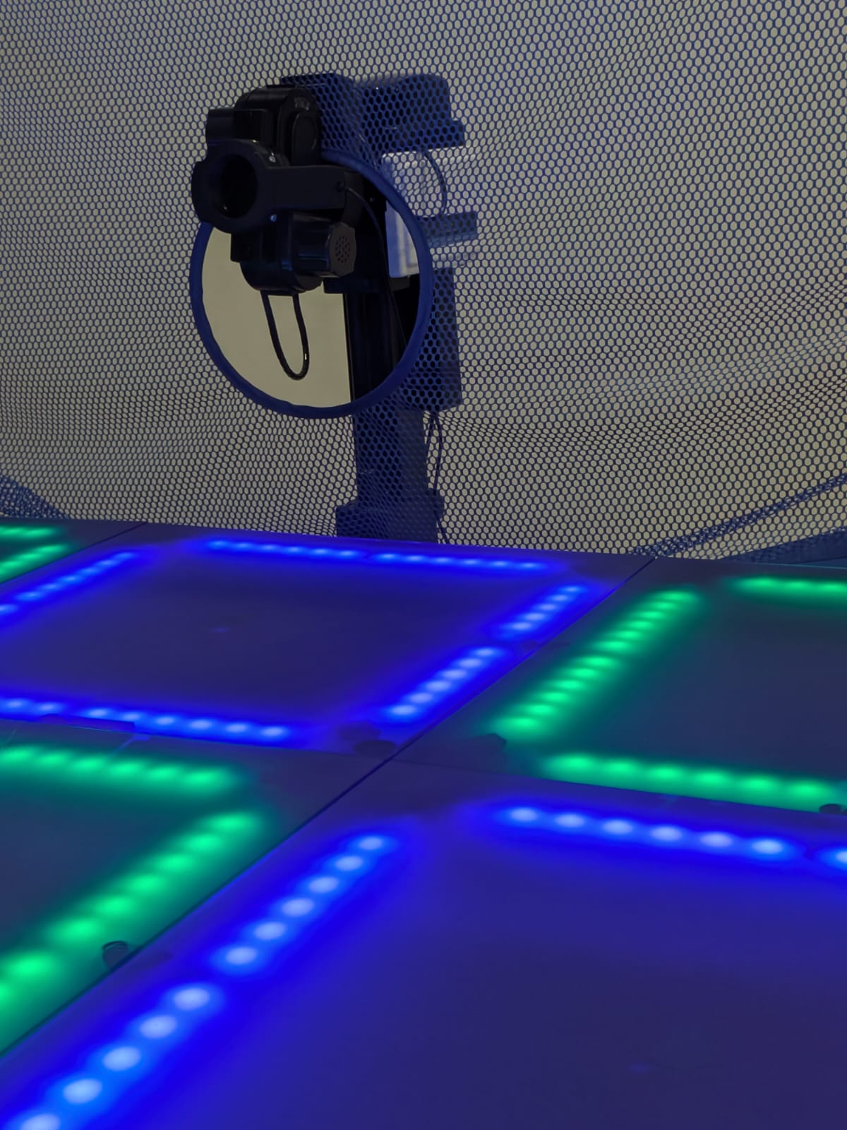 A close up of the Fastpong tiles and robot