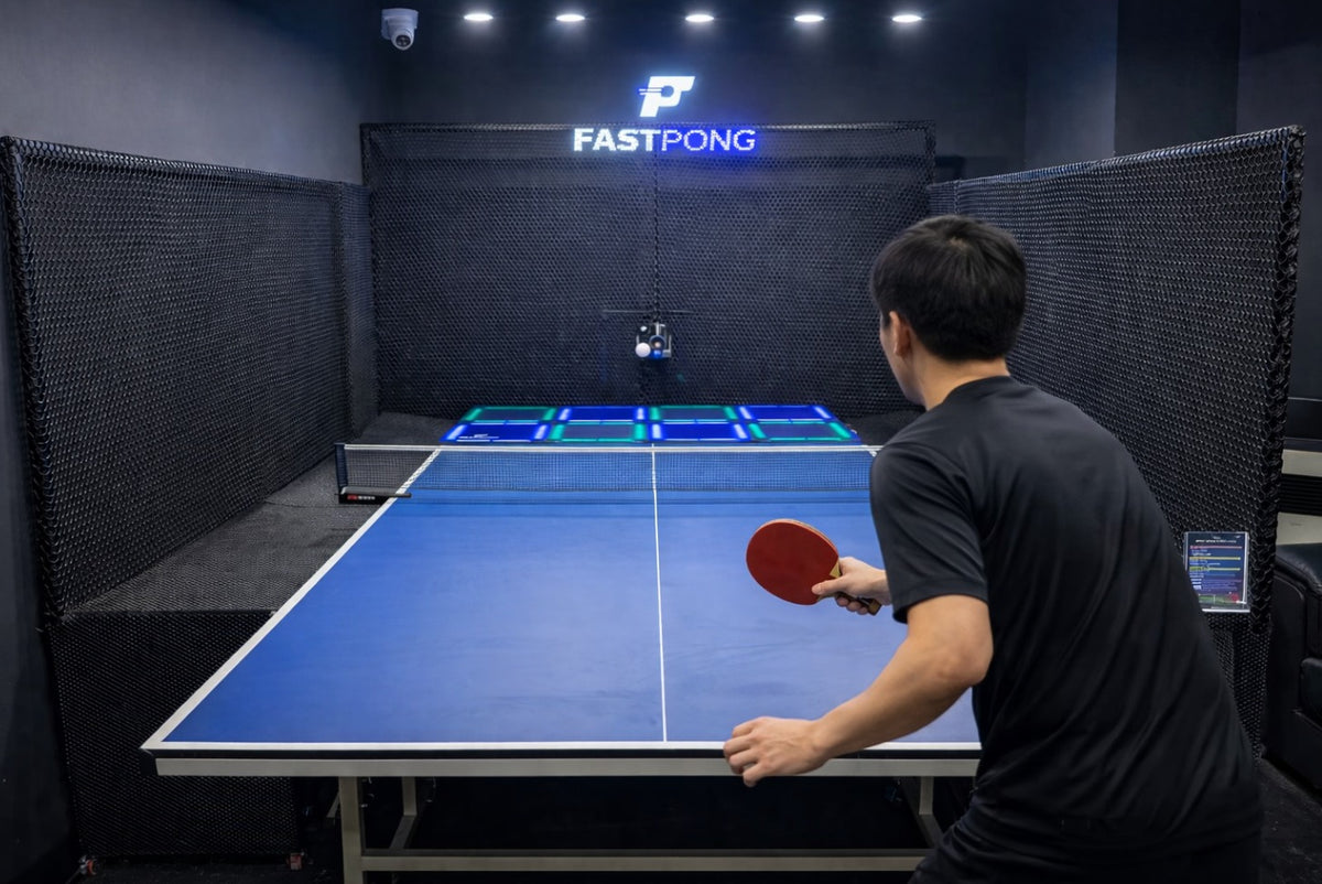 Person playing in a Fastpong commercial installation.