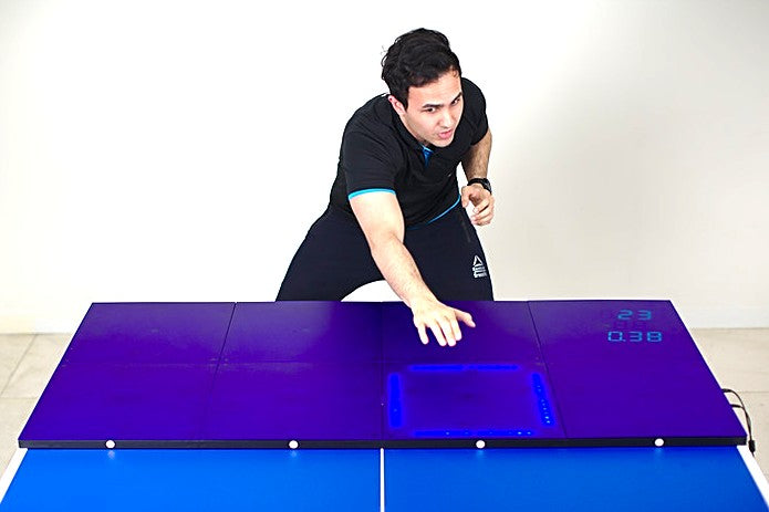 Table tennis student training reaction times with the Fastpong tiles