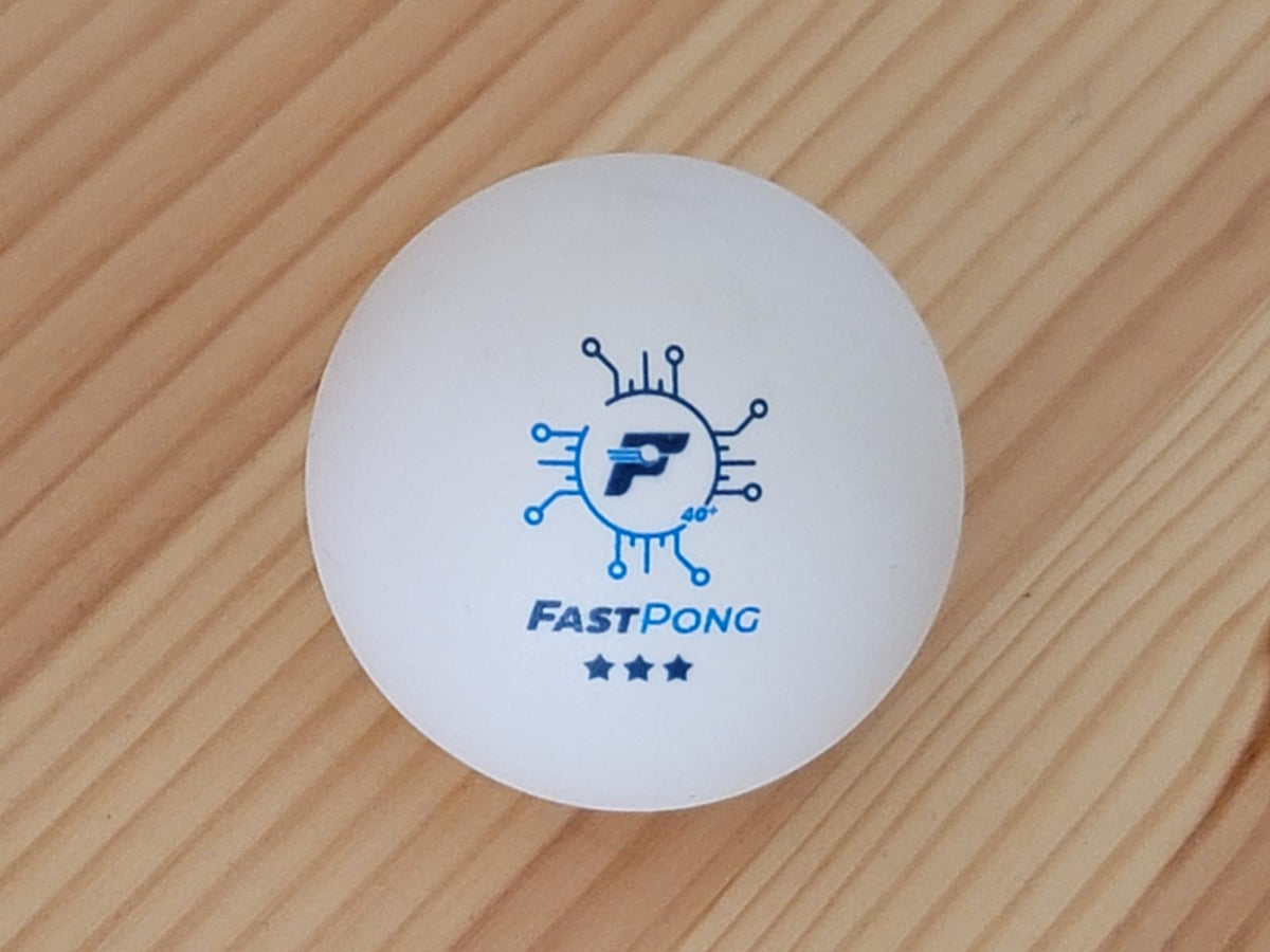 Fastpong table tennis ball on a wooden background